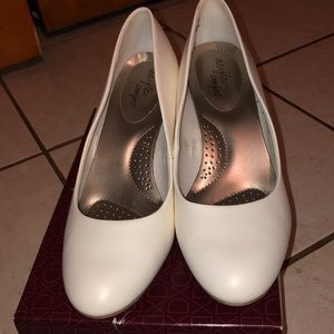 White 3 in heel shoes